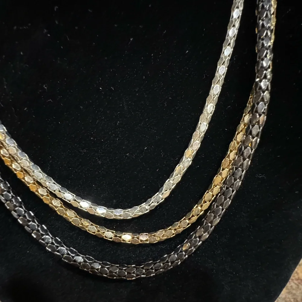 Necklace 3 Strand looks like Gold Silver Platinum. 16 to 20 in adjustabl…